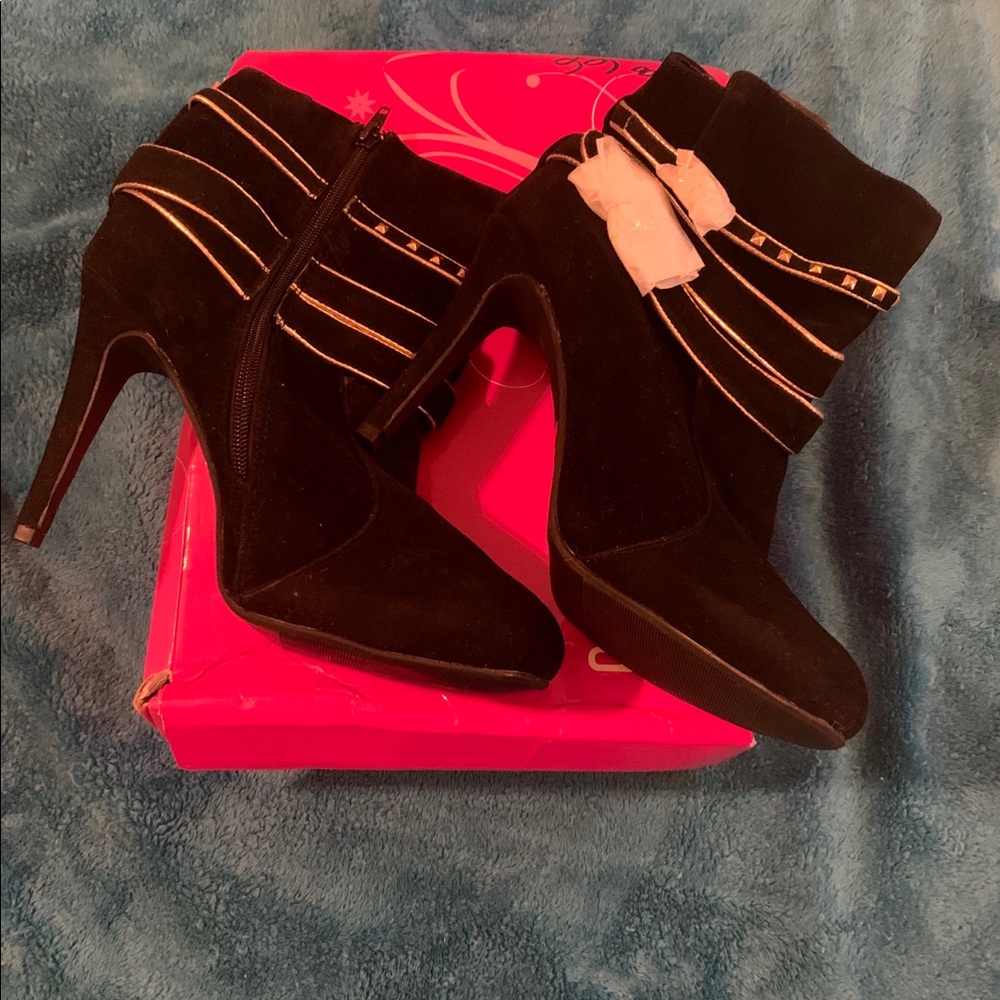 Black suede bootie with gold trim